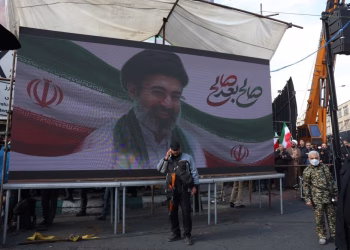 epa12806597 A billboard featuring a picture of newly appointed Supreme Leader Ayatollah Mojtaba Khamenei is displayed during a gathering in support of him in Tehran, Iran, 09 March 2026. The late Supreme Leader Ayatollah Ali Khamenei was killed during a joint Israeli and US military operation across Iran in the early hours of 28 February 2026.  EPA/ABEDIN TAHERKENAREH